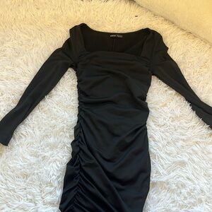 This shien black body con dress in size Xsmall